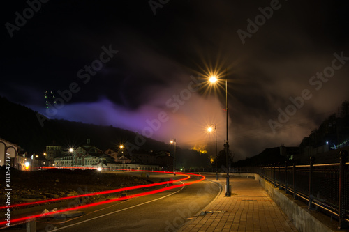 Purple clouds of the night city in Krasnaya Polyana Sochi.