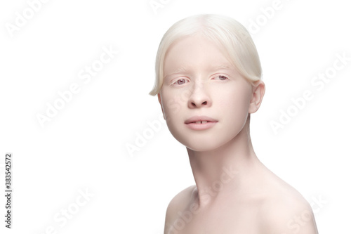 Perfect. Portrait of beautiful albino woman isolated on white studio background. Beauty, fashion, skincare, cosmetics concept. Copyspace. Well-kept skin, fresh look. Inclusion and diversity. photo