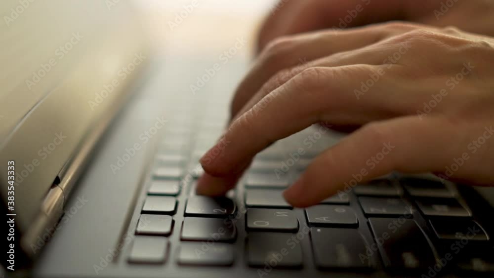 Close-up of Female Hands Typing on a Laptop Keyboard. A Woman is Working Hard at Her Laptop. A Female Freelancer Uses A Laptop. Close-up of Female Hands Typing on a Laptop Keyboard. A Woman is Working Hard at Her Laptop. A Female Freelancer Uses A Laptop.