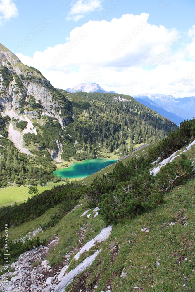Fototapeta premium Turquoise shining Seebensee in the Austrian Alps close to Ehrwald in Tyrol 