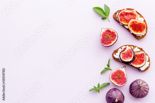 Canape or sandwich with figs and cheese, overhead view