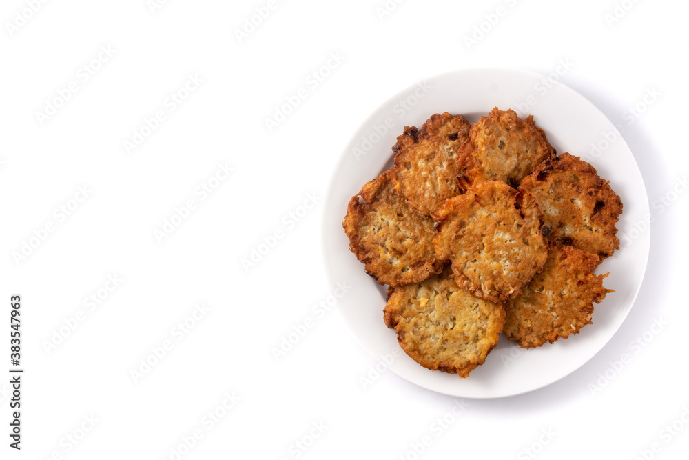 Traditional Jewish latkes or potato pancakes isolated on white background.Top view. Copy space