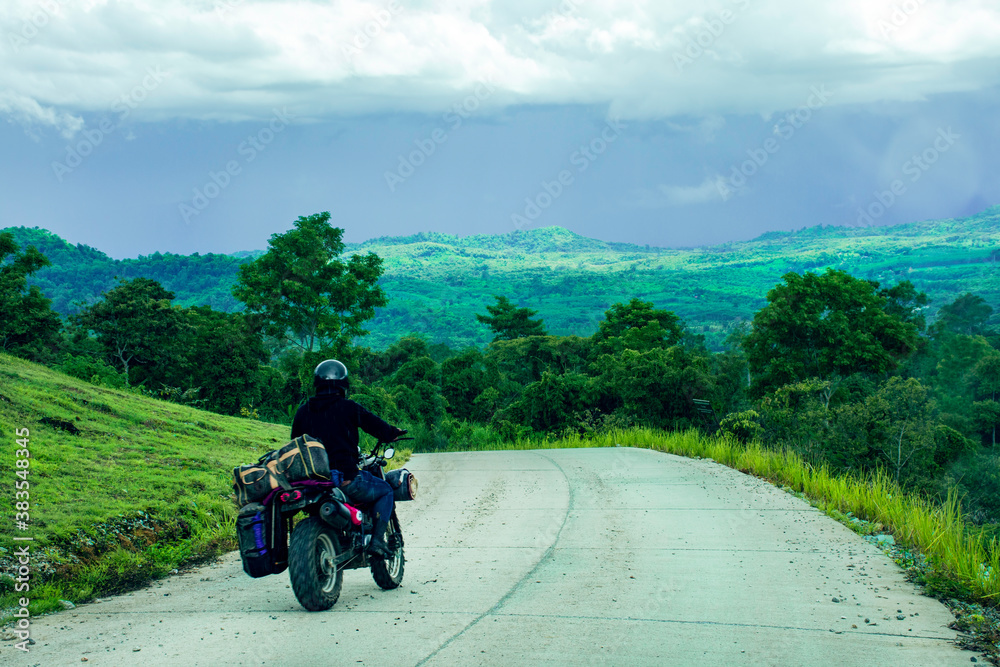 Travelling on green mountain road with raining, Holiday activity, Beautiful landscape mountain in Thailand Travelling on green mountain road with raining, Holiday activity, Beautiful landscape mountain in Thailand