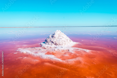 Pink salt formation Lake. Water of this lake is heavily saturated with salt and has a bright pink color. photo