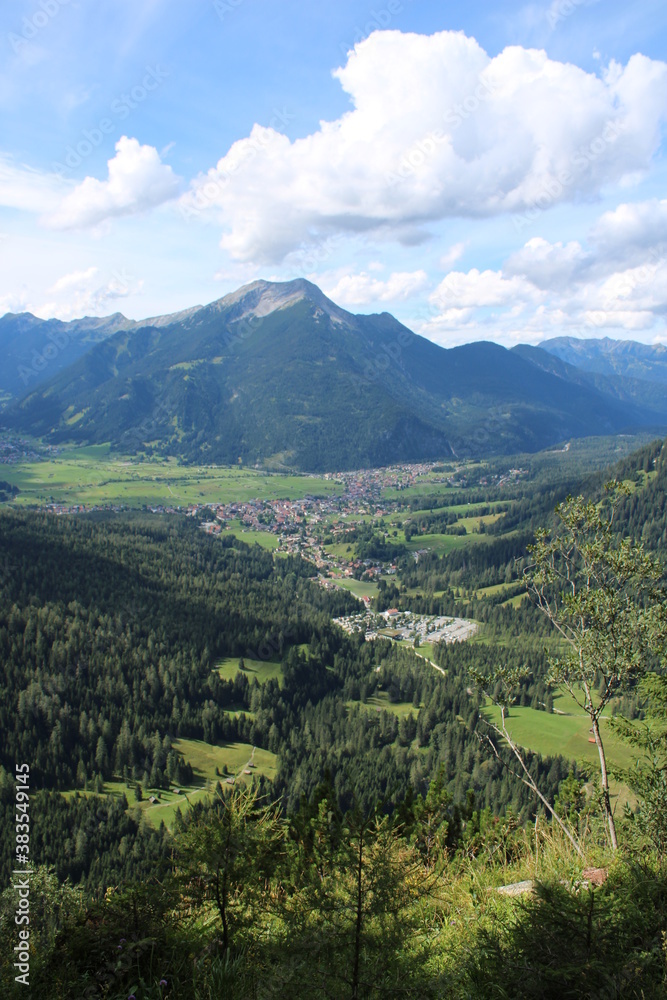 Aerial image of the city of Garmisch-Partenkirchen taken on Kramer Mountain in COVID-19 summer 2020
