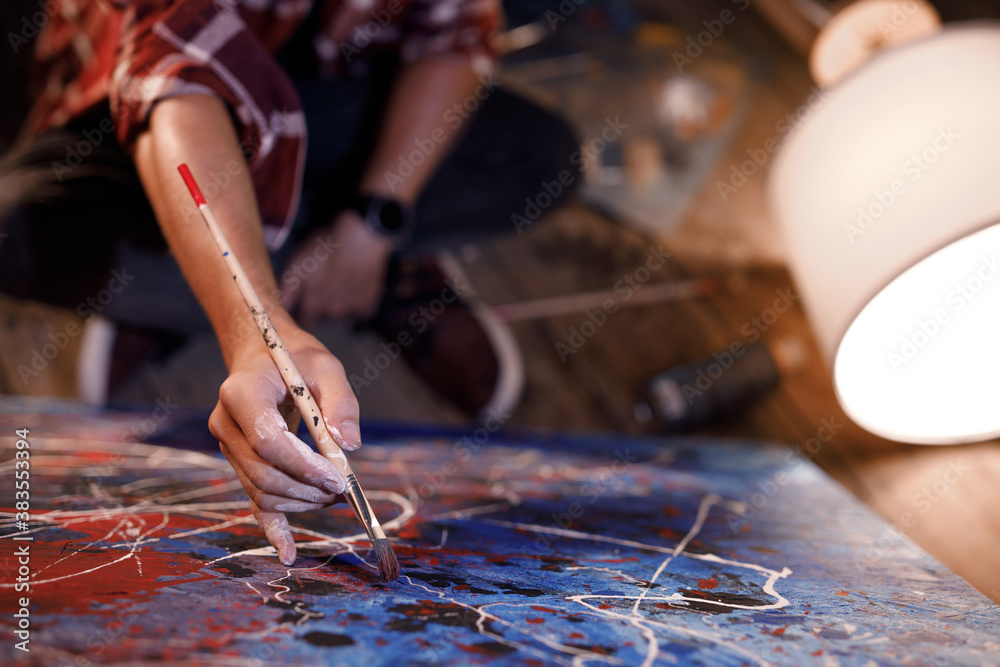 Obraz premium Moving paint brush artist works on abstract oil painting in creative modern studio. Abstract Modern Art.