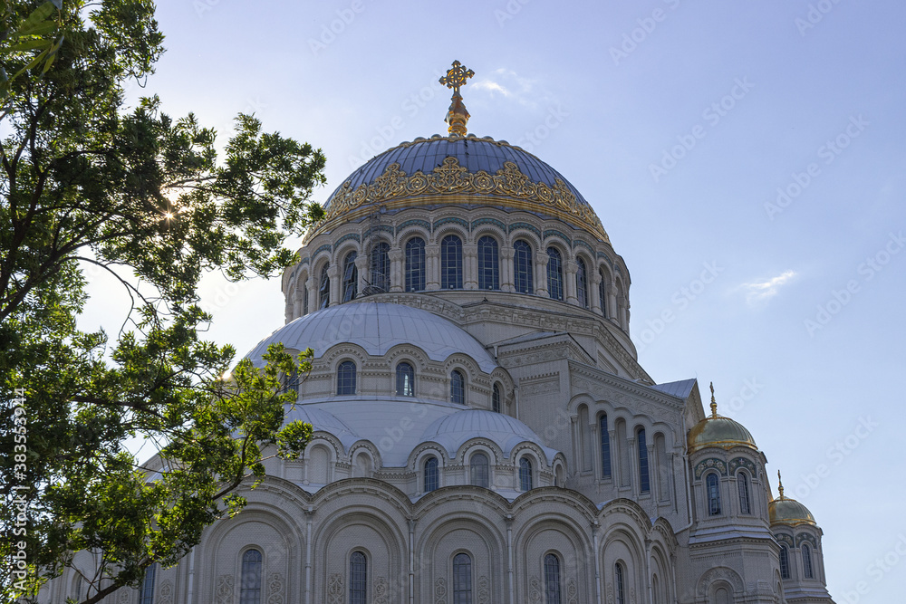 Kronshtadt, Saint Petersburg, Russia,09.08.2020. The Cathedral of St. Nicholas the Wonderworker. Blue sky, clouds and sunny weather. important religious site.