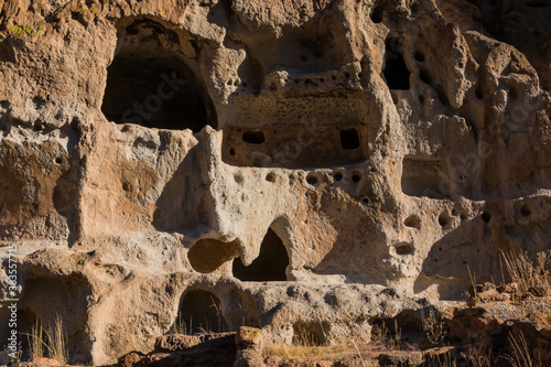 Remains of Ancient Puebloan Cave Dwellings, Bandelier National Monument, New Mexico, USA photo