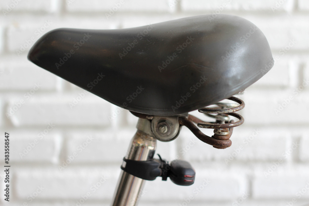 Rusty spring of the old bicycle seat. Rusty spring of the old bicycle seat.