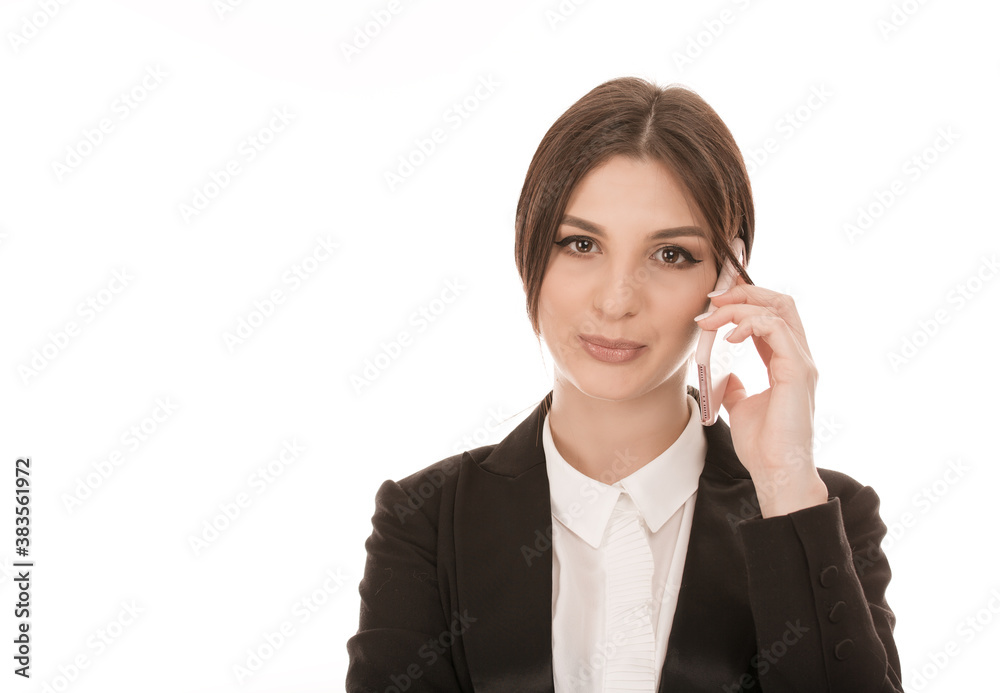 Portrait serious business woman talking on phone on white Portrait serious business woman talking on phone on white