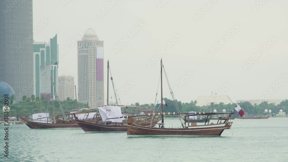 Dhow boats floating in Qatar west bay corniche on National day Dhow boats floating in Qatar west bay corniche on National day