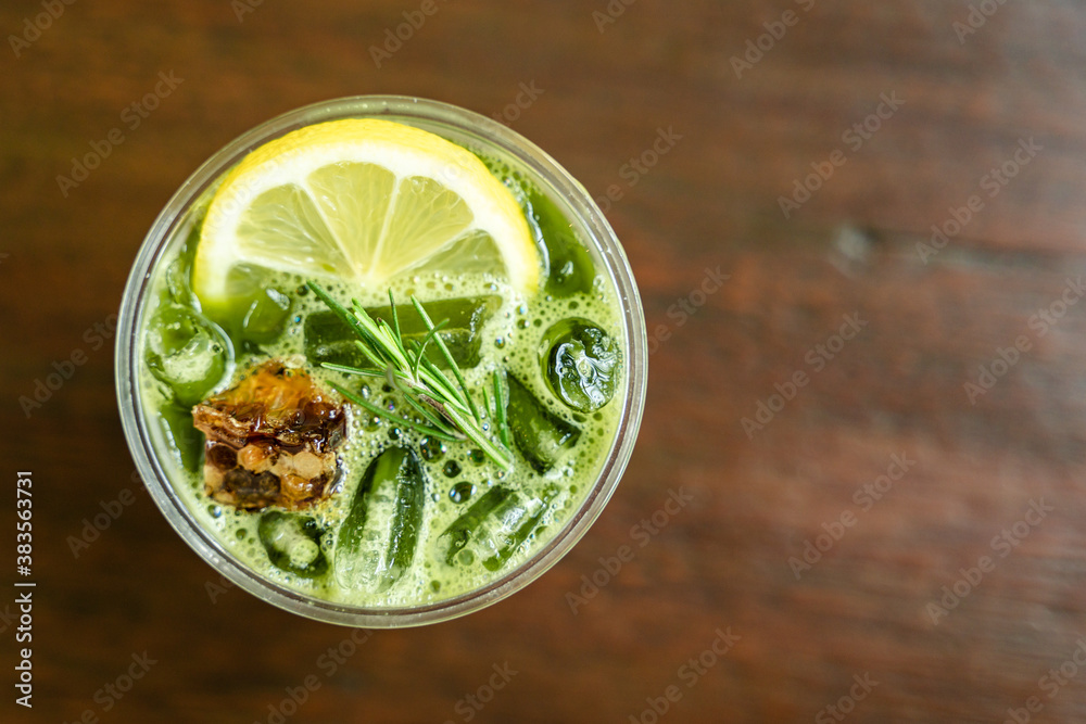 Close-up shot of delicious honey lemon green tea drink Close-up shot of delicious honey lemon green tea drink