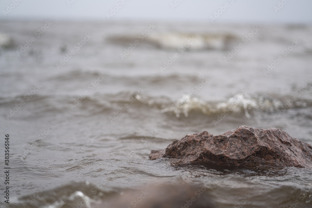 Stones washed by waves on the shore. Stones washed by waves on the shore.
