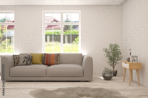 White living room with sofa and summer landscape in window. Scandinavian interior design. 3D illustration