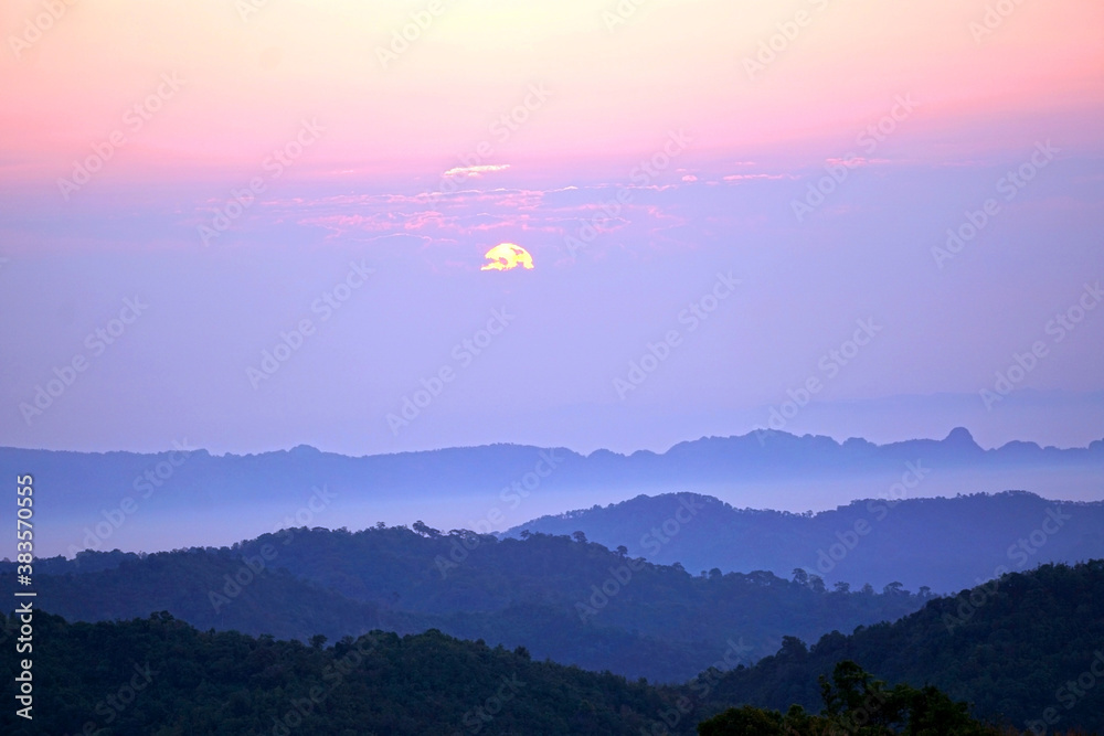 sunrise over the mountains view in morning fog with colorful twilight sky sunrise over the mountains view in morning fog with colorful twilight sky