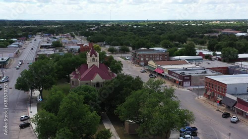 Orbiting view of Courthouse and a Small Town, Brady, Texas, USA photo