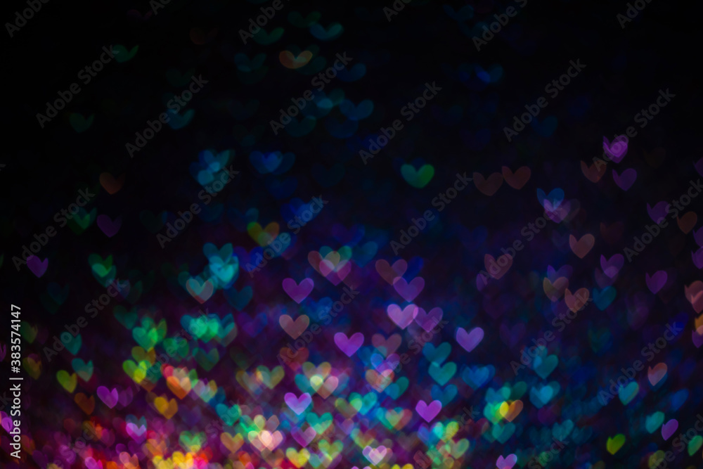 Decoration bokeh glitters background, abstract blurred backdrop with circles,modern design wallpaper with sparkling glimmers. Purple, blue and pink backdrop glittering sparks with blur effect