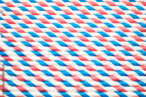 spiral striped drinking straws isolated on white background
