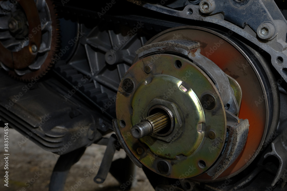 Naklejka premium Damaged motorcycle engine spare parts close-up