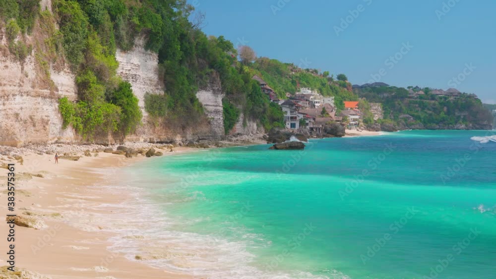 Top view on amazing Pantai Cemongkak Hidden beach beach Bali, Indonesia. 4K
