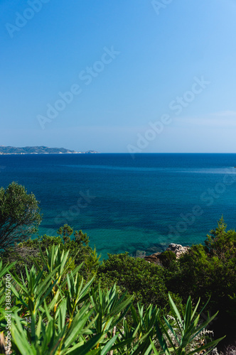 crystal clear mediterranean sea under the blue sky. Marina di Teulada