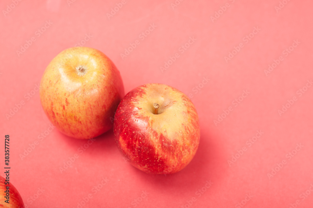 apples on a red background apples on a red background