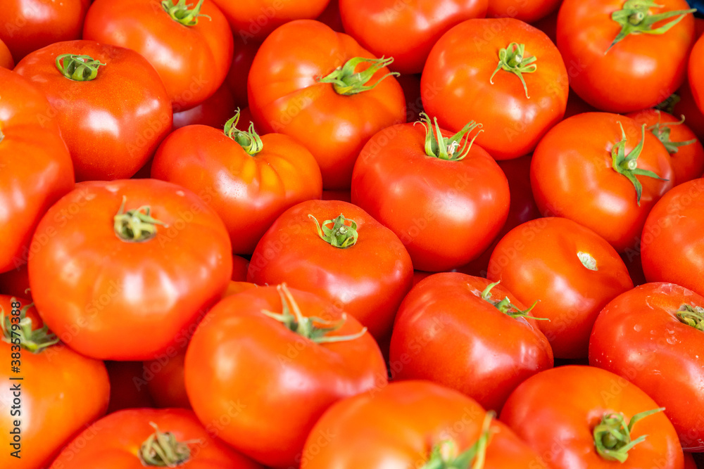 Group of tomatoes in turkish market in Antalia, Turkey. Red fresh tomatoes background Group of tomatoes in turkish market in Antalia, Turkey. Red fresh tomatoes background