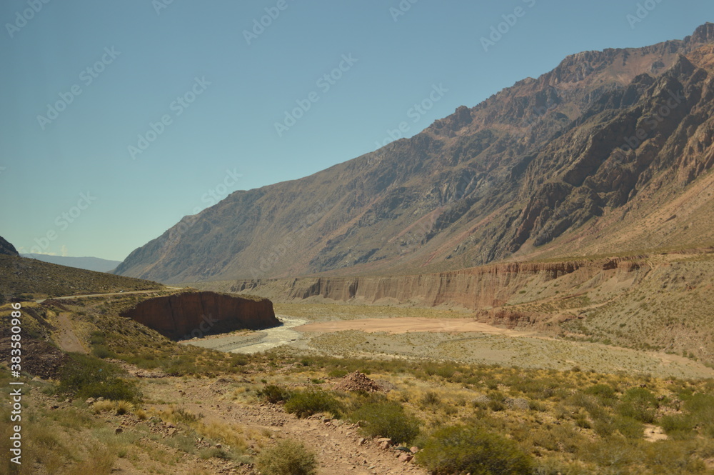 Driving and hiking in the Andes Mountains between Chile and Argentina on the way to Mendoza Driving and hiking in the Andes Mountains between Chile and Argentina on the way to Mendoza