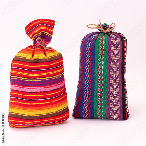Colourful handmade traditional coffee bags in isolated white background