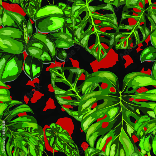 Tropical seamless pattern on animalistic texture. Jungle exotic summer print. Summer tropical leaf. Tropical flower fashion pattern. Floral tropic illustration. Vector seamless pattern.