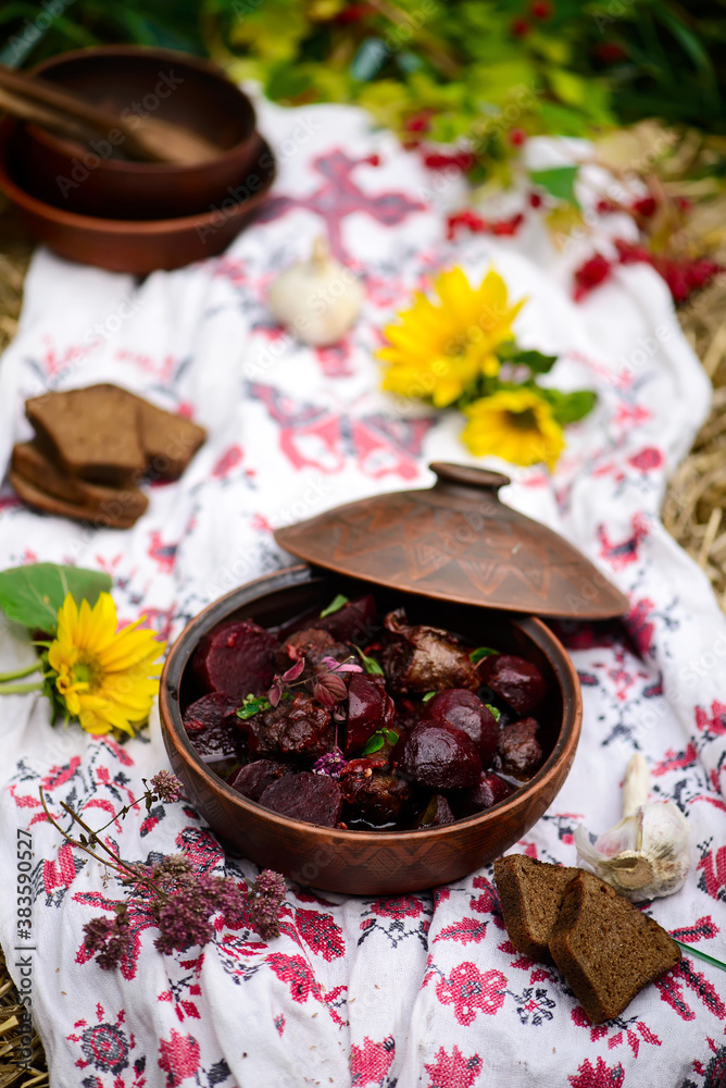 Traditional Ukrainian stew with beet shpundrya..style rustic Traditional Ukrainian stew with beet shpundrya..style rustic