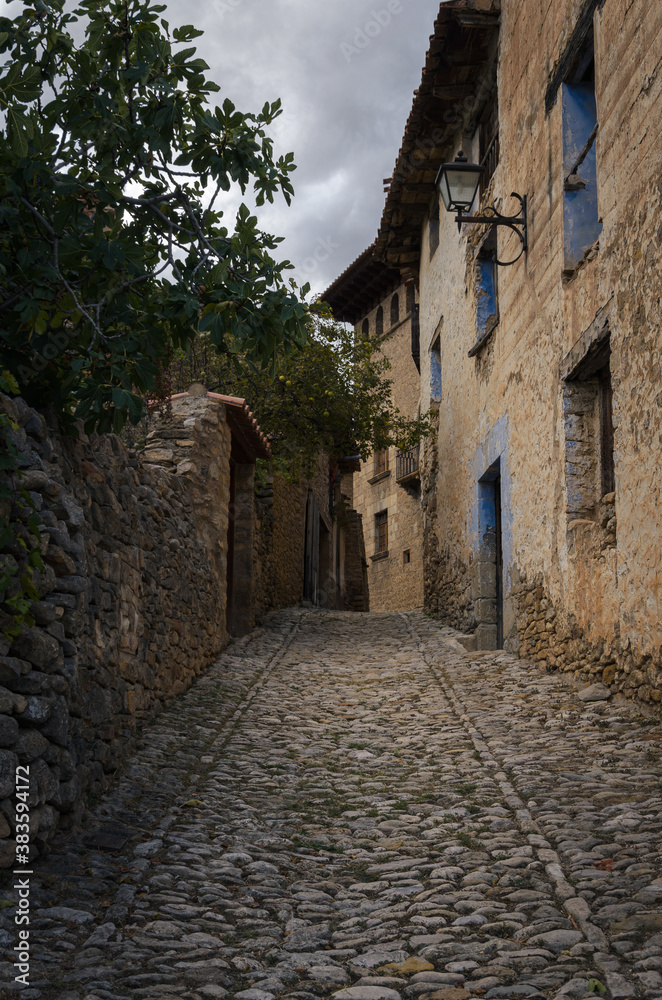 Cobbled streets and stone houses in the medieval village of Mirambel, Teruel , Spain