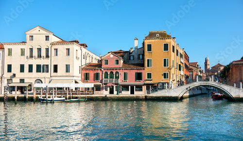 Traditional houses and foot bridge  view from Grand Canal in Venice  Italy.