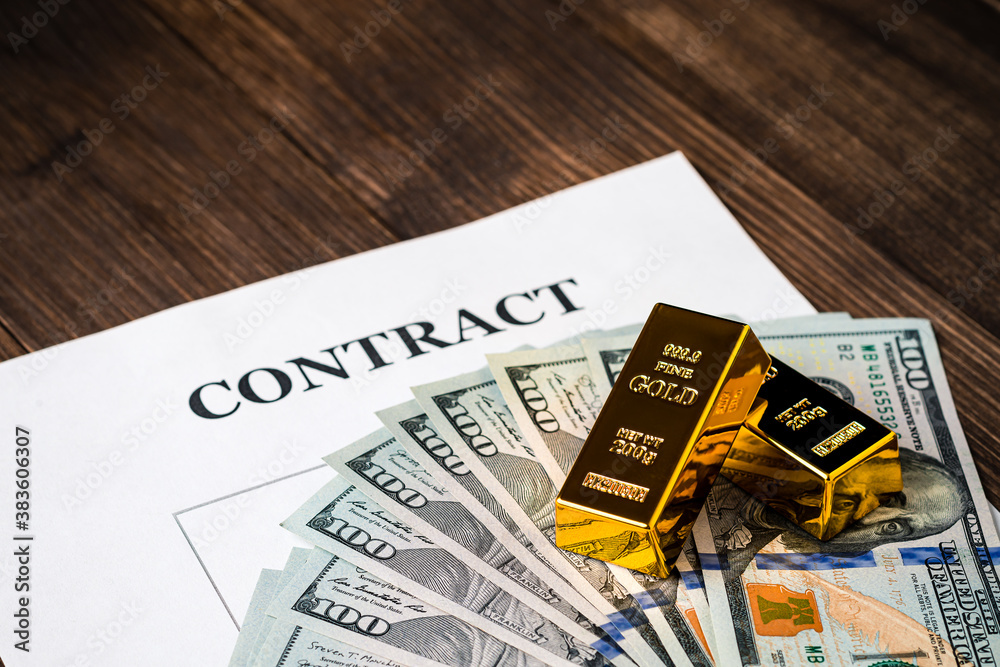 Signing a contract, Contract with payment in gold bars and dollars Signing a contract, Contract with payment in gold bars and dollars