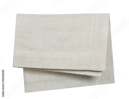 Folded beige burlap cloth isolated.Food decoration napkin.Grey tablecloth.