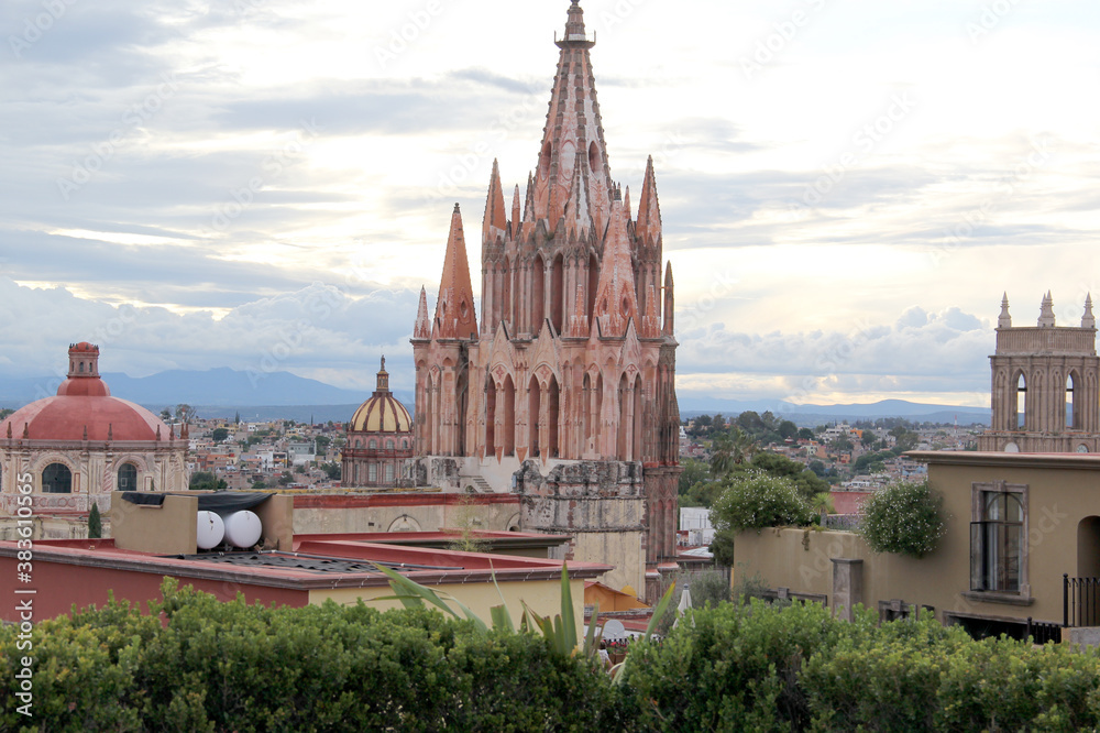 view of dome and towers of cathedral and town of San Miguel de Allende in Guanajuato Mexico