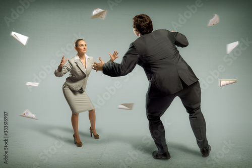 two businessmen fighting as sumoist photo