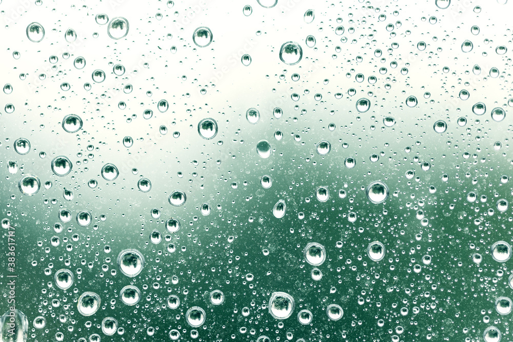 waterdrops on green surface, abstract background, space for text waterdrops on green surface, abstract background, space for text