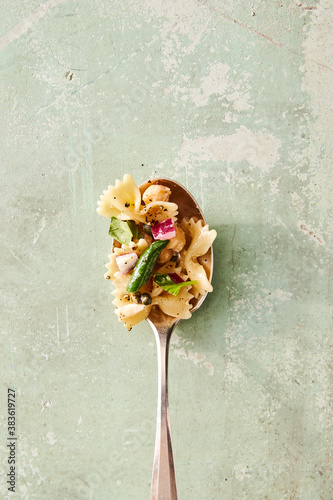 Overhead view of pasta served in spoon