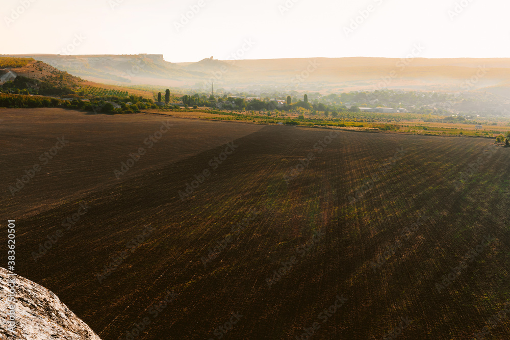 Obraz premium View of a wide valley, summer nature scenery at sunset