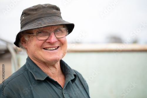 smiling happy short-sighted old bloke