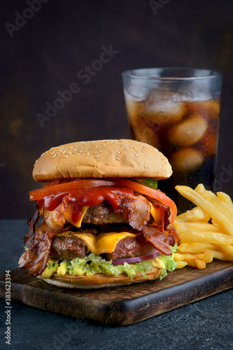 Delicious fresh Burger with French fries and Cola