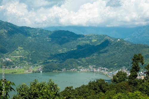 Aerial view of the Lakeside area in Pokhara city, Nepal, with the surrounding hills and Phewa Lake