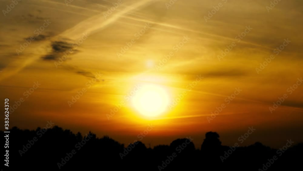 Dramatic orange sky on a warm autumn evening (seamless loop) Dramatic orange sky on a warm autumn evening (seamless loop)