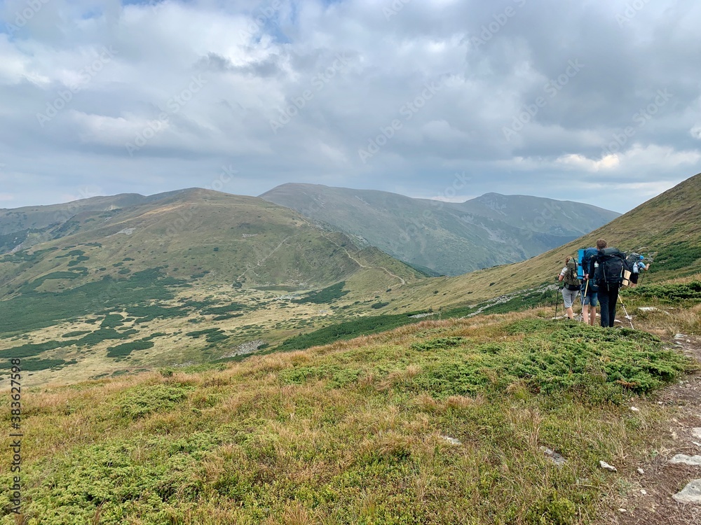 Hiking group at Carpathian mountains in summer