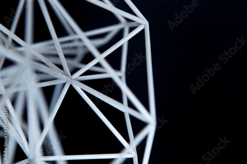 Fototapeta Naklejka Na Ścianę i Meble -  Abstract structure 3D printed. Net structure against black background. Abstrakte Struktur 3D gedruckt.
Netz Struktur vor schwarzem Hintergrund. 