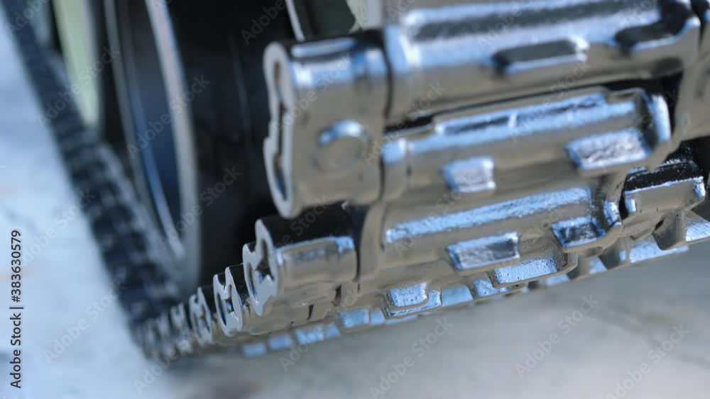 Battle tank track wheels. Close-up detail of a war tank. Battle tank track wheels. Close-up detail of a war tank.