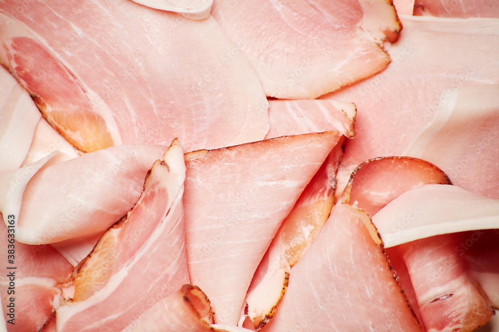 Thin sliced and served cured prosciutto beacon ham background texture Thin sliced and served cured prosciutto beacon ham background texture