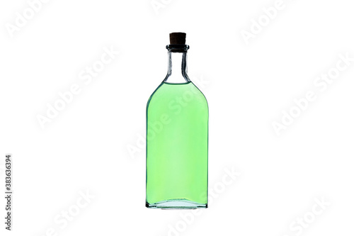 Old style glass medical or chemical bottle with green transparent liquid isolated on white background. Corked bottle of mysterious liquid. Magic spell and potion concept. 