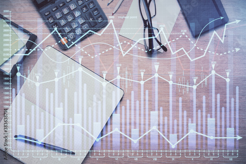 Double exposure of forex graph drawing and work table top veiw. Concept of financial analysis. © peshkova